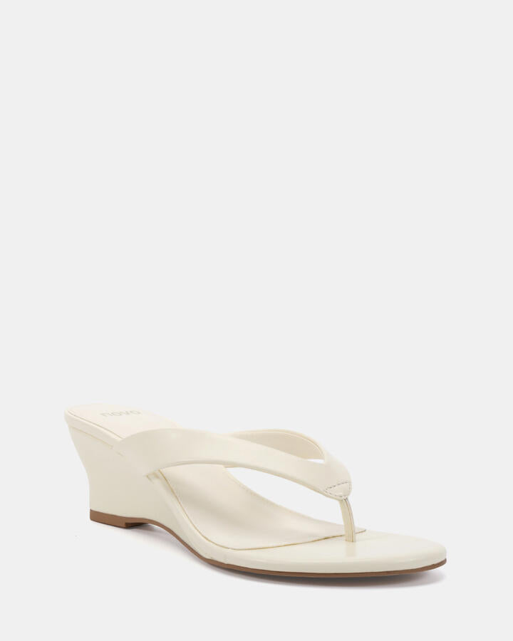 Image of Boots. Product name - Zepher Butter Vegan Wedges in Yellow colour by brand - Novo