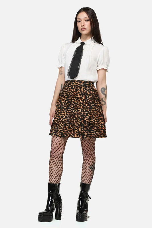 Image of a model wearing Skirts. Product name - Leopard Print Grunge Skirt in Brown colour by brand - Dangerfield