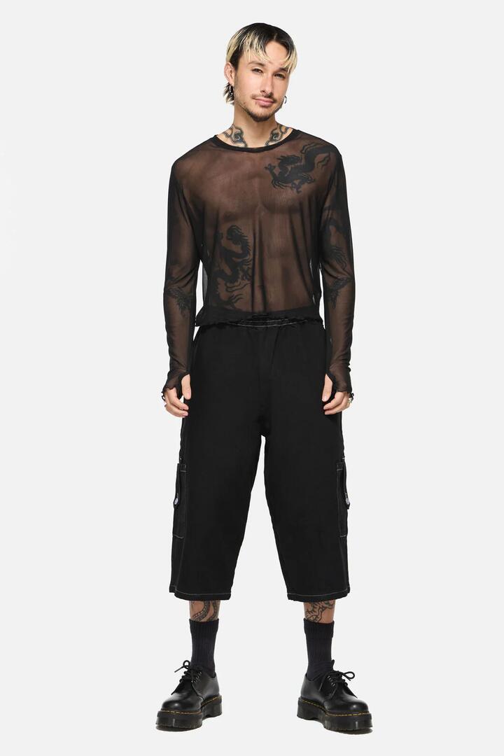 Image of a model wearing Shorts. Product name - Vixi Relaxed Fit Denim Short in Black colour by brand - Black Friday