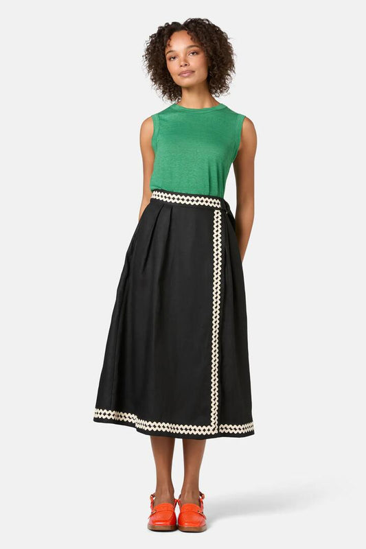 Image of a model wearing Skirts. Product name - Cindy Linen Midi Skirt in Black colour by brand - Gorman