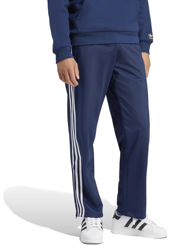 Image of a model wearing Pants. Productname: Adidas Firebird Track Pant in Night Indigo colour by brand - Adidas