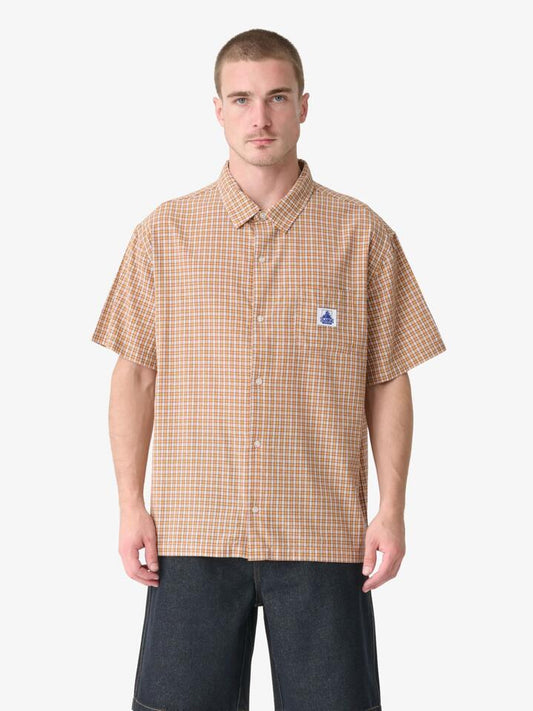 Image of a model wearing Shorts. Productname: Xlarge Eli Short Sleeve Shirt in Orange colour by brand - Xlarge