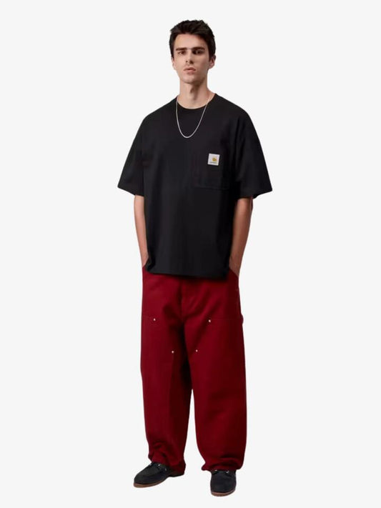 Image of a model wearing Tops. Productname: Carhartt Wip Work Pocket T-Shirt in Black colour by brand - Carhartt Wip