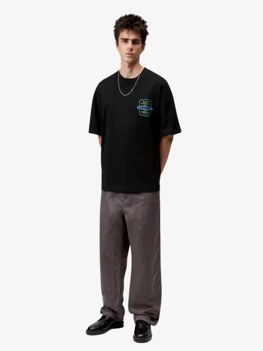 Image of a model wearing Shorts. Productname: Carhartt Wip Short Sleeve Networks T-Shirt in Black colour by brand - Carhartt Wip