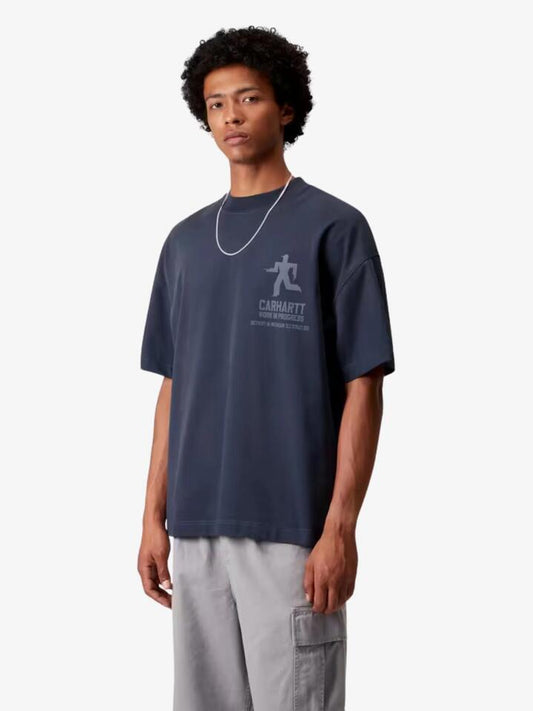 Image of a model wearing Shorts. Productname: Carhartt Wip Short Sleeve Distance T-Shirt in Jupiter Stone Dyed colour by brand - Carhartt Wip