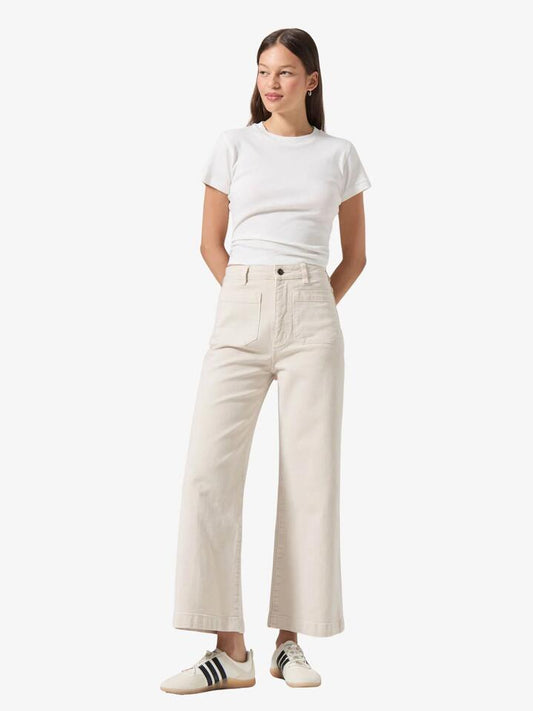 Image of a model wearing Tops. Productname: Rollas Classic Tee in Vintage White colour by brand - Rollas