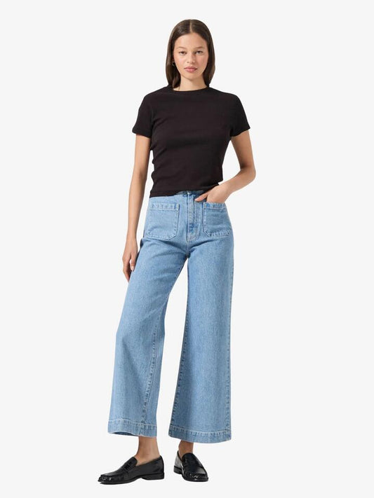 Image of a model wearing Tops. Productname: Rollas Classic Tee in Washed Black colour by brand - Rollas