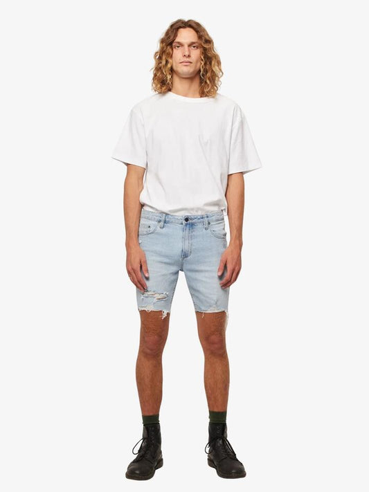 Image of a model wearing Shorts. Productname: Rollas Tim Slim Shorts in Cali Blue colour by brand - Rollas