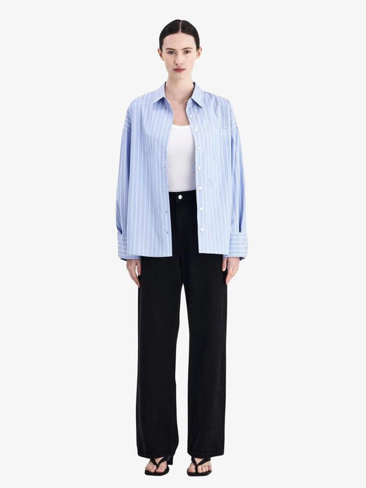 Image of a model wearing Tops. Productname: Nude Lucy Organic Poplin Shirt in Sky Stripe colour by brand - Nude Lucy