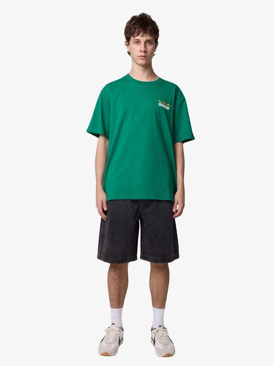 Image of a model wearing Tops. Productname: Worship Services Tee in Verdant colour by brand - Worship