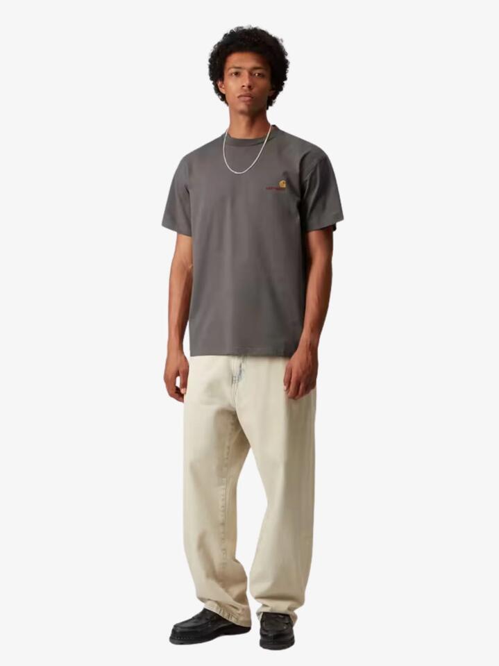 Image of a model wearing Shorts. Productname: Carhartt Wip Short Sleeve American Script T-Shirt in Porphyry colour by brand - Carhartt Wip