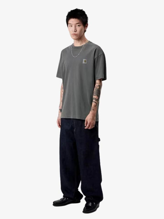 Image of a model wearing Shorts. Productname: Carhartt Wip Short Sleeve Vista T-Shirt in Black Garment Dyed colour by brand - Carhartt Wip