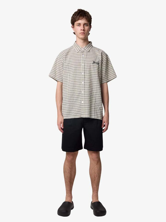 Image of a model wearing Shorts. Productname: Thrills Rampage Short Sleeve Cropped Shirt in Smog colour by brand - Thrills