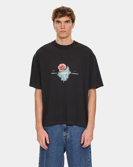 Image of a model wearing Tops. Productname: thrills Mens Deadly Popular Oversized T-Shirt Faded Black - in Faded Black colour by brand - Thrills