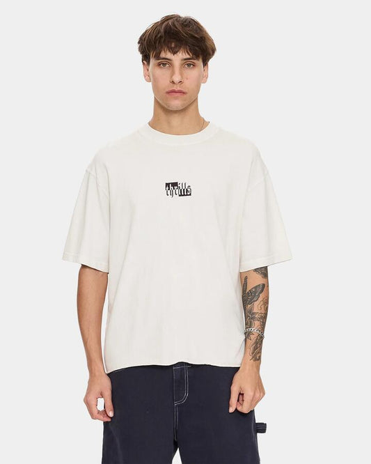 Image of a model wearing Tops. Productname: thrills Mens Excitement Excitement Embroidery T-Shirt Lily White - in Lily White colour by brand - Thrills