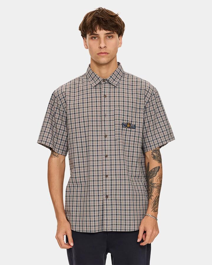 Image of a model wearing Tops. Productname: thrills Mens Eyes In The Grass Short Sleeve Shirt Light Grey - in Light Grey colour by brand - Thrills