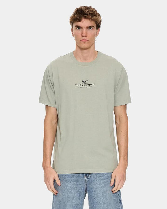 Image of a model wearing Tops. Productname: thrills Mens A Heaven For The Restless T-Shirt Dirty Sage - in Dirty Sage colour by brand - Thrills