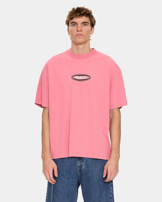 Image of a model wearing Tops. Productname: thrills Mens Bueno Bueno Beno Oversized T-Shirt Gum - in Gum colour by brand - Thrills