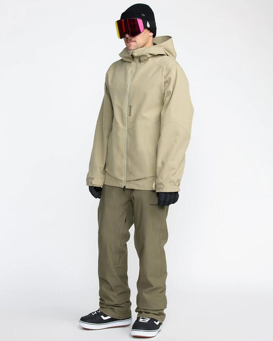 Image of a model wearing Pants. Productname: Volcom Mens Freakin Snow Chino Pants Military - in Military colour by brand - Volcom