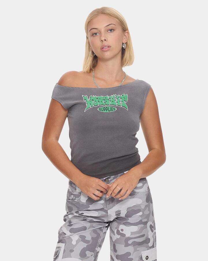 Image of a model wearing Tops. Product name - Worship Womens Whisp Cold Shoulder Tank Top Worn Black in Worn Black colour by brand - Worship