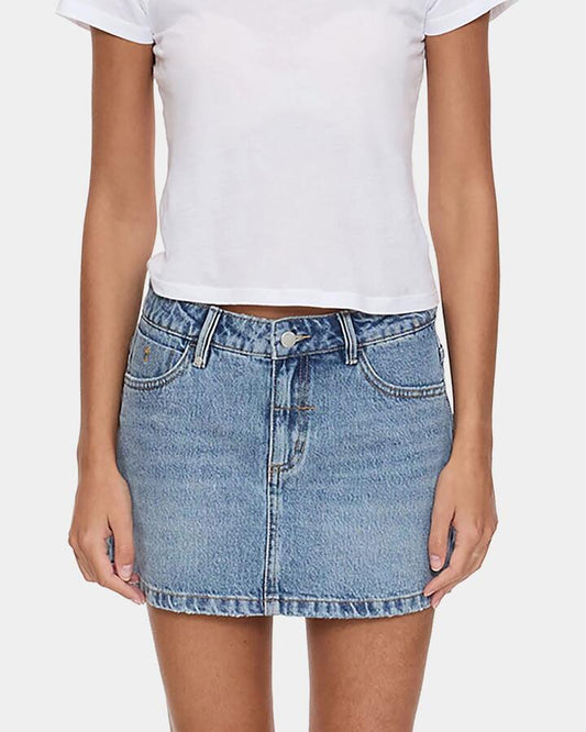 Image of a model wearing Skirts. Product name - Thrills Womens Sophie Denim Mini Skirt Rustic Fade in Rustic Fade colour by brand - Thrills
