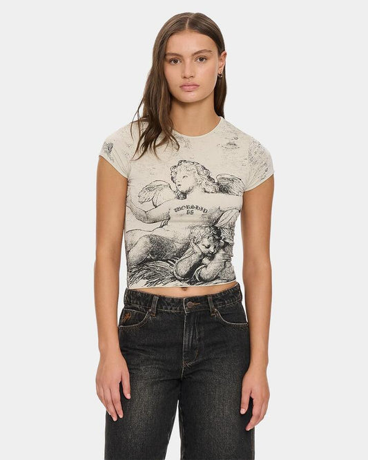 Image of a model wearing Tops. Productname: worship Womens Dreamers Cap Sleeve T-Shirt Stone - in Stone colour by brand - Worship