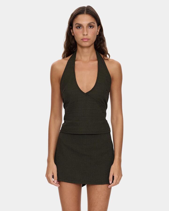 Image of a model wearing Tops. Product name - Thrills Womens Lost Control Halter Tank Top Tarmac in Tarmac colour by brand - Thrills
