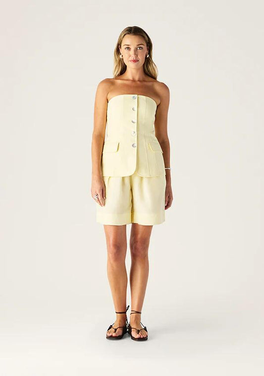 Image of a model wearing Tops. Productname: Monaco Suiting Bustier in Butter Yellow colour by brand - MOS The Label