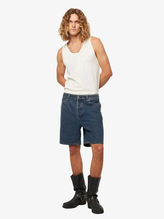 Image of a model wearing Shorts. Productname: Rollas Ezy Shorts in Mid Vintage Indigo colour by brand - Rollas