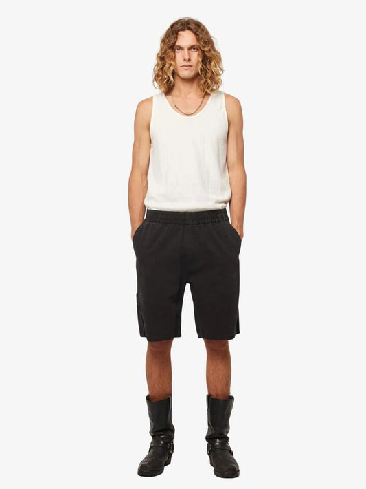 Image of a model wearing Shorts. Productname: Rollas Tradie Carpenter Shorts in Sulphur Black colour by brand - Rollas