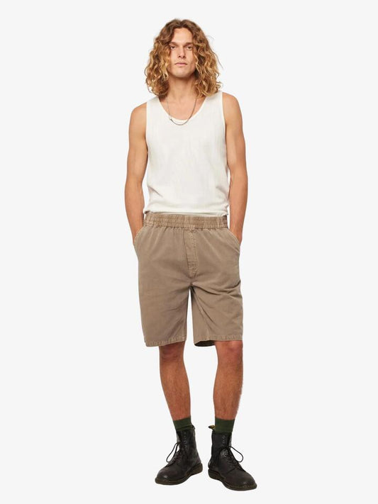 Image of a model wearing Shorts. Productname: Rollas Tradie Carpenter Shorts in Mushroom colour by brand - Rollas