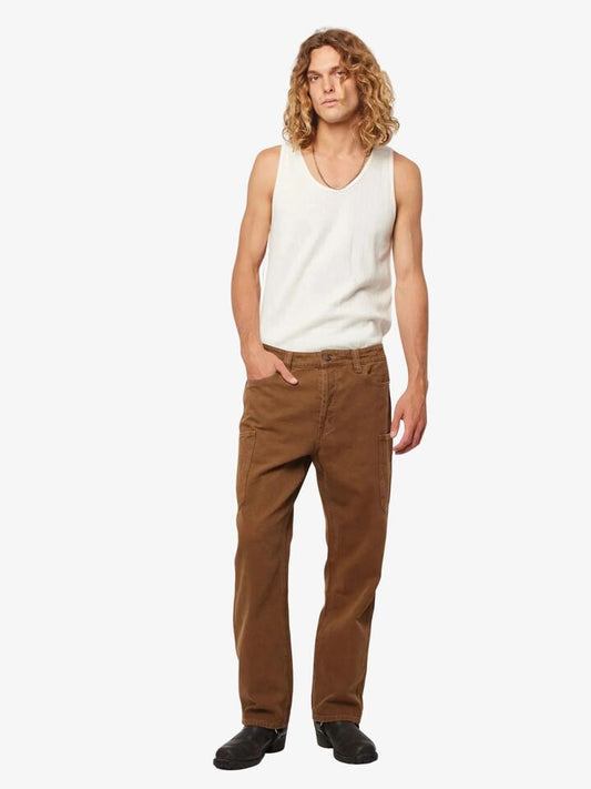 Image of a model wearing Pants. Productname: Rollas Ezy Electric Canvas Pants in Caramel colour by brand - Rollas
