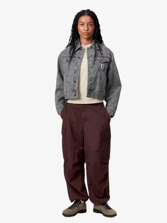 Image of a model wearing Outerwear. Productname: Carhartt Wip Women's Duck Orell Jacket in Camo Duckblackheavy Bleached colour by brand - Carhartt Wip