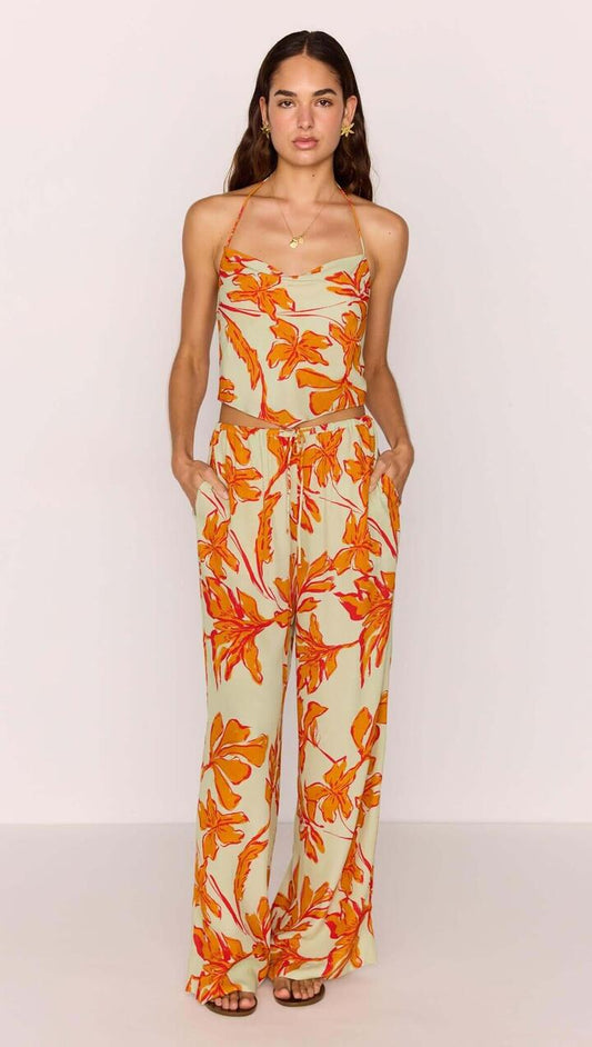 Image of a model wearing Pants. Product name - Green & Orange Floral Drawstring Wide Leg Pant in Mint Floral colour by brand - MINKPINK