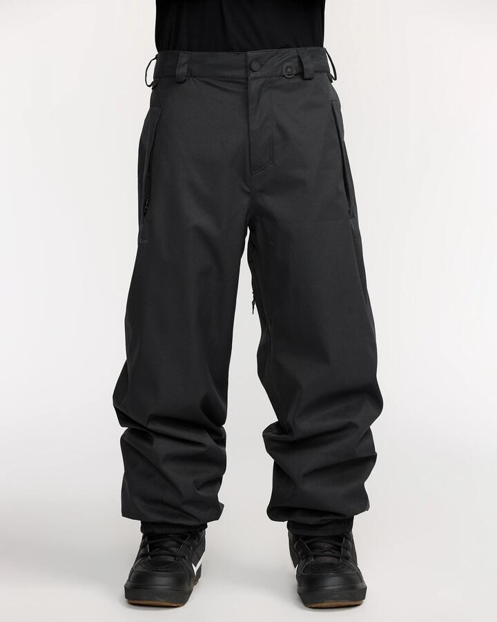 Image of a model wearing Pants. Product name - Volcom Mens Arthur 20K Snow Pants Black in Black colour by brand - Volcom