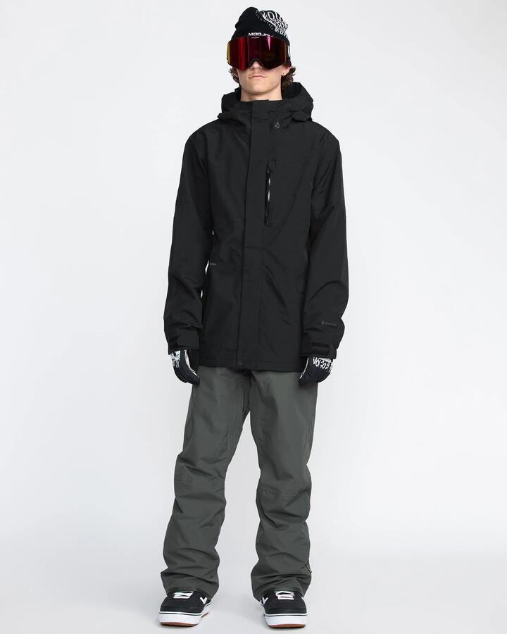 Image of a model wearing Pants. Product name - Volcom Mens L Gore-Tex Snow Pants Dark Grey in Dark Grey colour by brand - Volcom