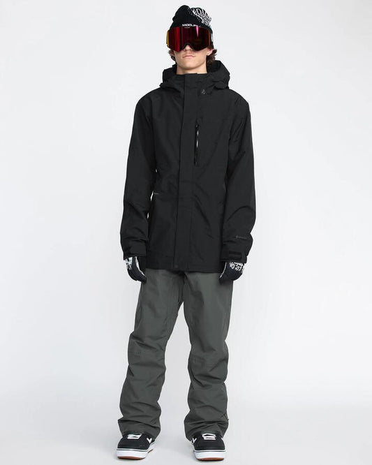 Image of a model wearing Pants. Productname: Volcom Mens L Gore-Tex Snow Pants Dark Grey - in Dark Grey colour by brand - Volcom