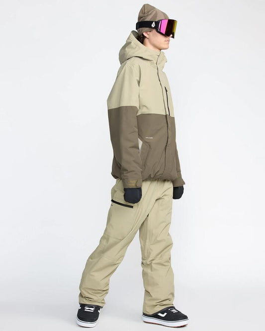 Image of a model wearing Pants. Productname: Volcom Mens L Gore-Tex Snow Pants Moss Green - in Moss Green colour by brand - Volcom