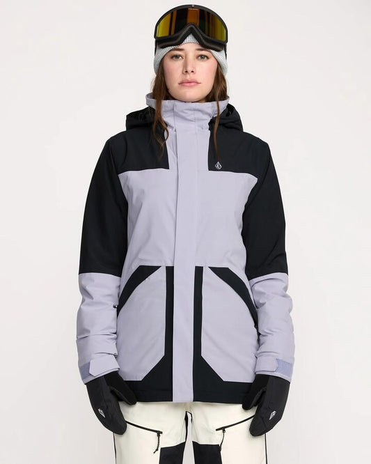 Image of a model wearing Outerwear. Productname: Volcom - Womens Shelter 20K 3D Stretch Jacket - Lavender Aura - in Lavender Aura colour by brand - Volcom