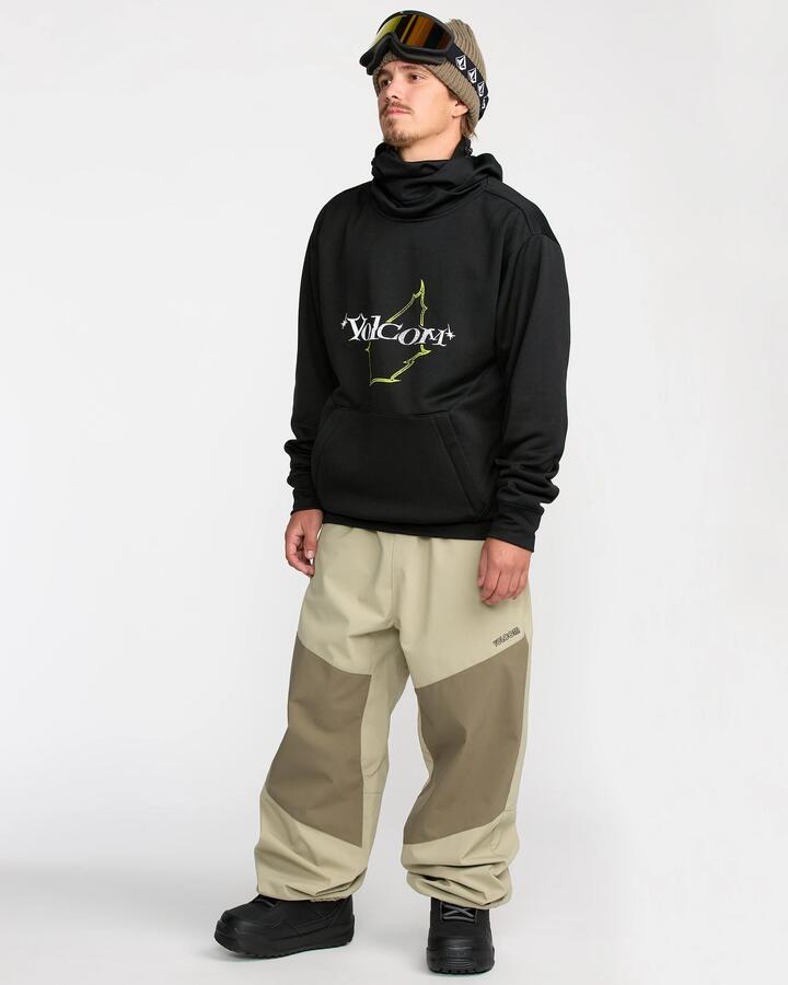 Image of a model wearing Pants. Product name - Volcom Mens Slash Slapper Snow Pants Moss Green in Moss Green colour by brand - Volcom