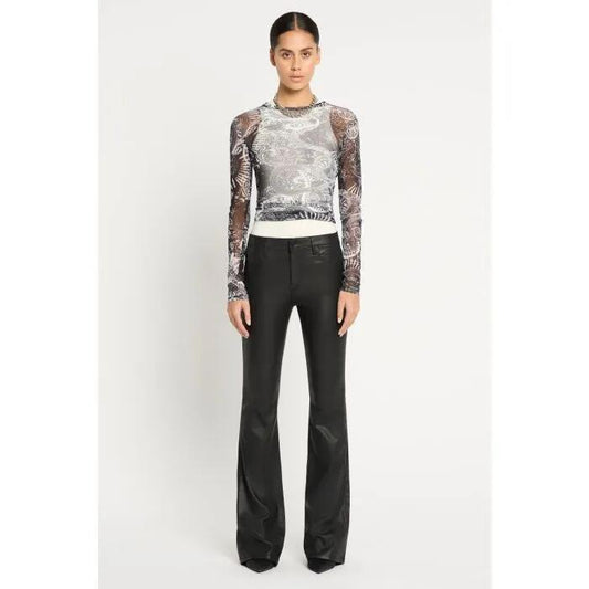 Image of a model wearing Denim. Productname: Black Magic Bootleg Jean in COATED BLACK colour by brand - sass and bide