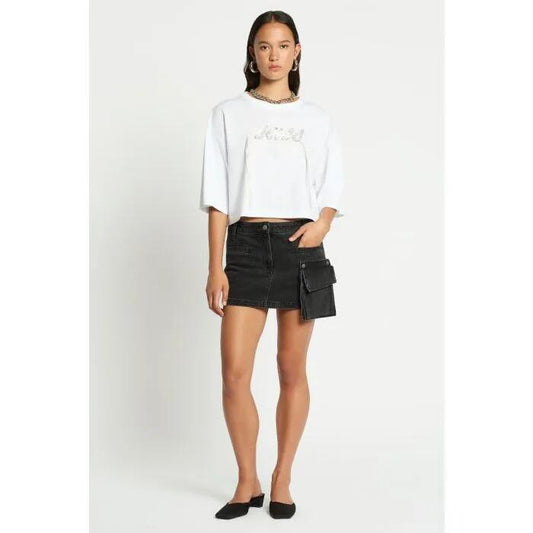 Image of a model wearing Skirts. Productname: Dark Knight Denim Mini Skirt in Washed Black colour by brand - sass and bide