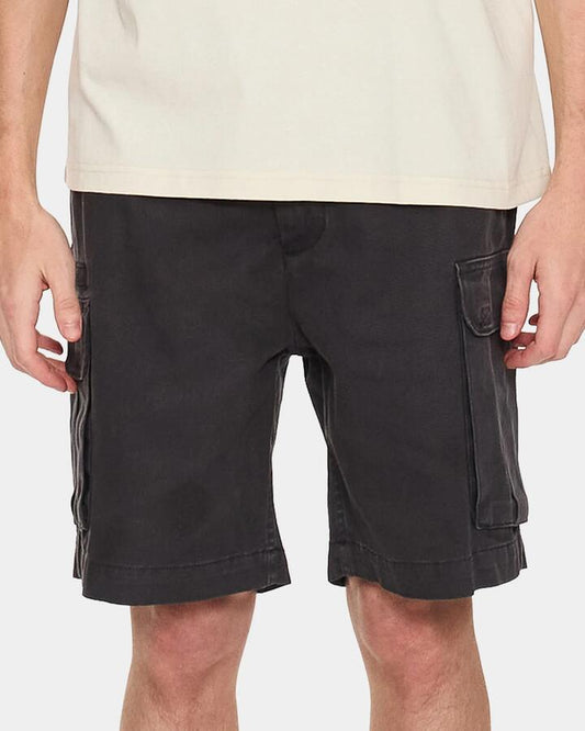 Image of a model wearing Shorts. Product name - Thrills Mens Slacker Union Relaxed Cargo Shorts Dark Charcoal in Dark Charcoal colour by brand - Thrills
