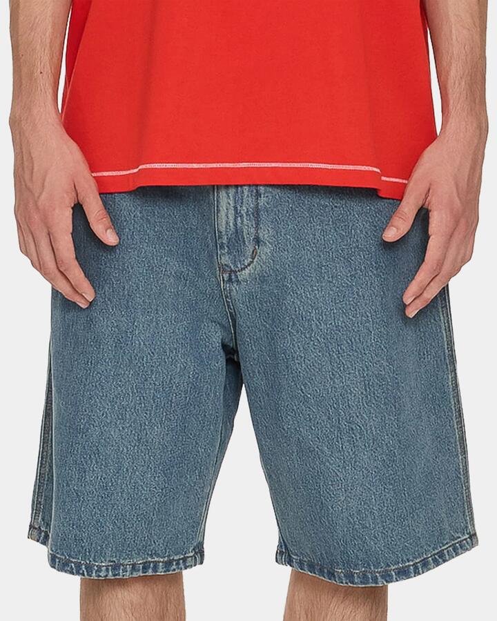Image of a model wearing Shorts. Productname: worship - Mens Hot Gossip Big Dawg Denim Shorts - Blue - in Blue colour by brand - worship