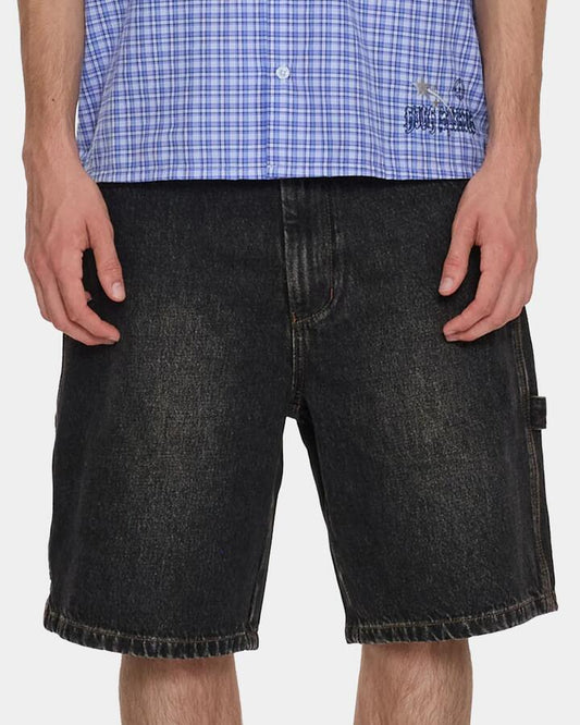 Image of a model wearing Shorts. Productname: worship - Mens Carpenter Denim Shorts - Worship Black Dust - in Worship Black Dust colour by brand - worship