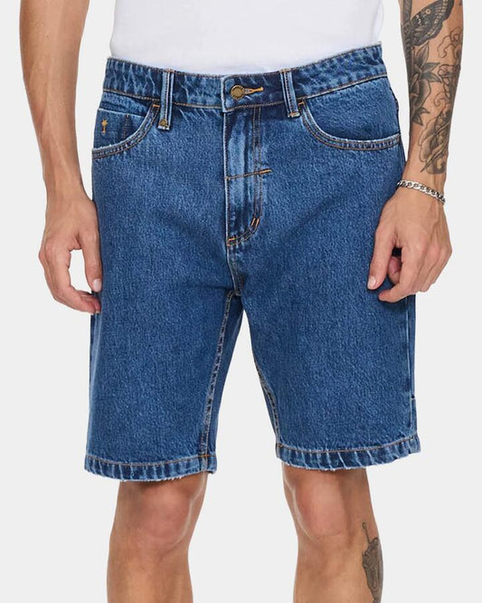 Image of a model wearing Shorts. Productname: thrills - Mens Chopped Hem Slim Straight Denim Shorts - Deep Vintage Blue - in Deep Vintage Blue colour by brand - thrills