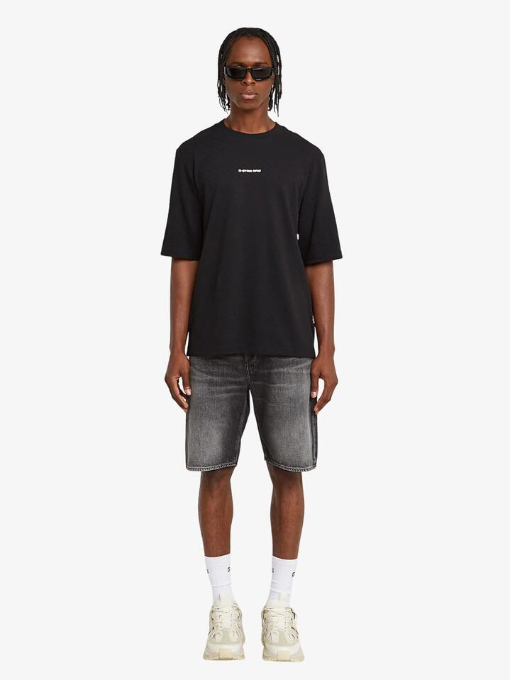Image of a model wearing Shorts. Productname: G-Star Dakota Shorts Clean Edge in Faded Scoria Grey colour by brand - G-Star