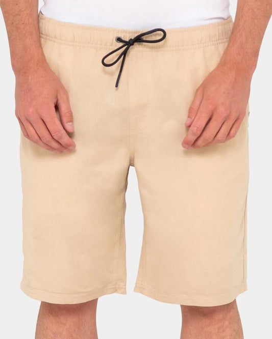 Image of a model wearing Shorts. Productname: rusty - Mens Overtone Cargo Shorts - Light Fennel - in Light Fennel colour by brand - rusty