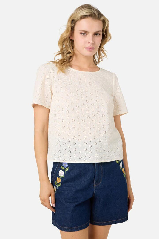 Image of a model wearing Tops. Product name - Asher Broderie Top in Cream colour by brand - Princess Highway
