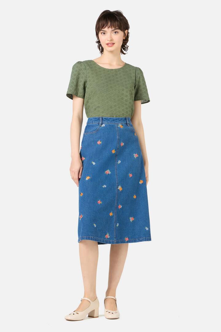 Image of a model wearing Skirts. Productname: Floral Embroidered Denim Skirt in Blue Denim colour by brand - Princess Highway